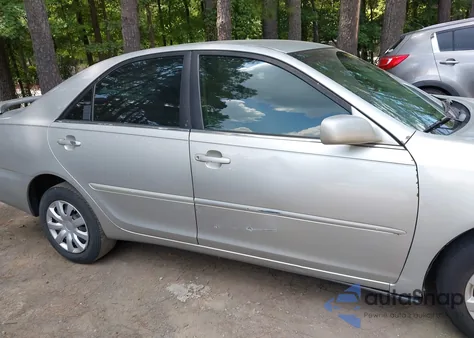 2003 Toyota Camry Le z USA, uszkodzony, nr VIN 4T1BE32K03U197691